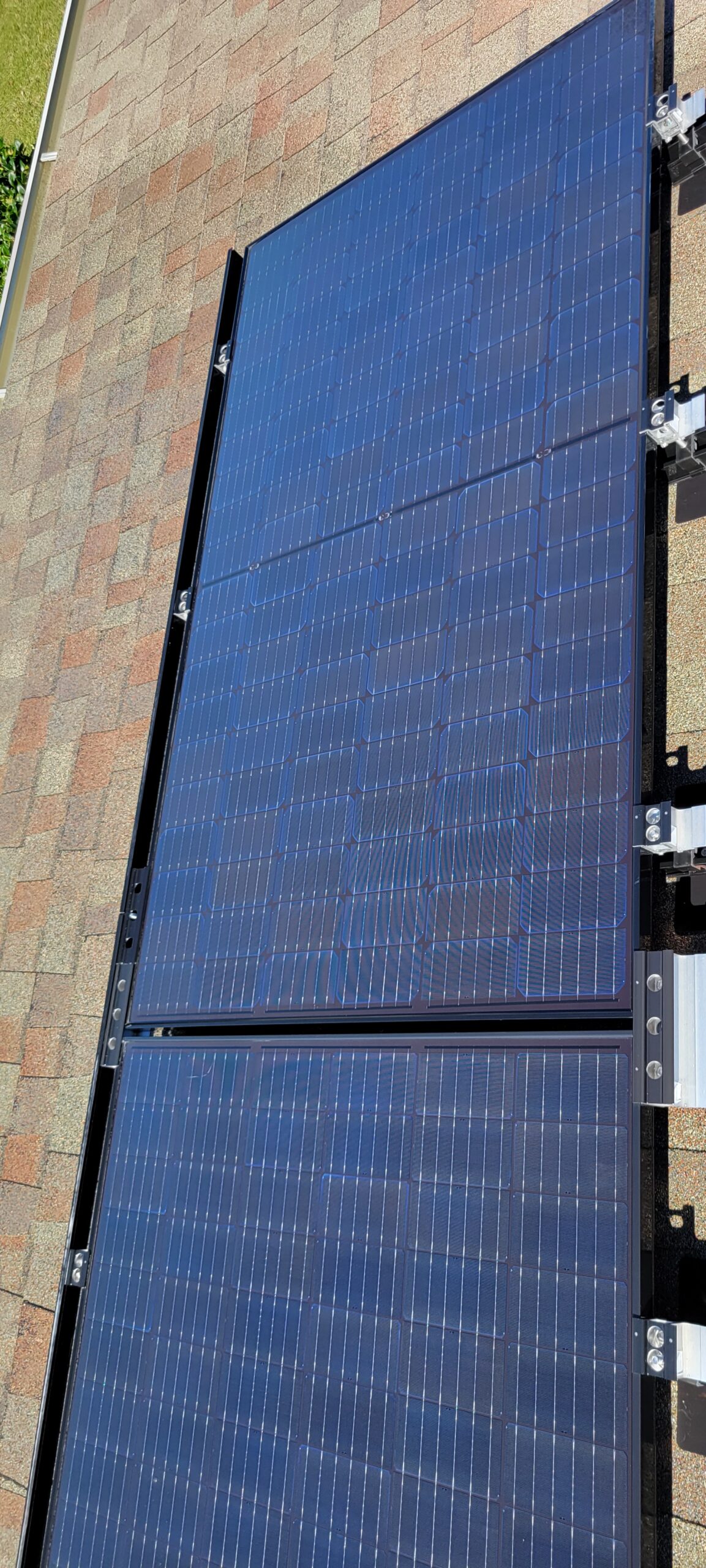 Clean solar panels after professional solar panel cleaning on a residential roof in The Villages, Florida