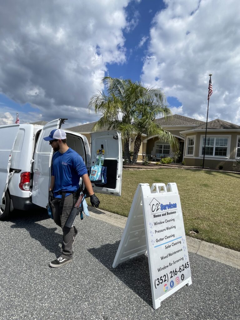 C2 Services technician arriving at a residential home for gutter cleaning in The Villages, Florida
