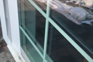 Professional interior window cleaning removing streaks and buildup in a home in The Villages, Florida