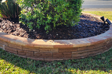 Pressure washed brick planter and retaining wall at a residential home in The Villages, Florida